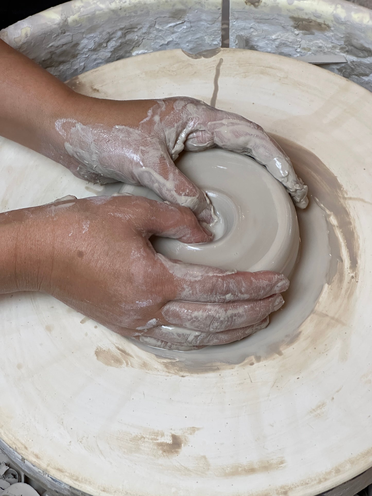 Centering and openin clay on the wheel is the most important part of throwing.